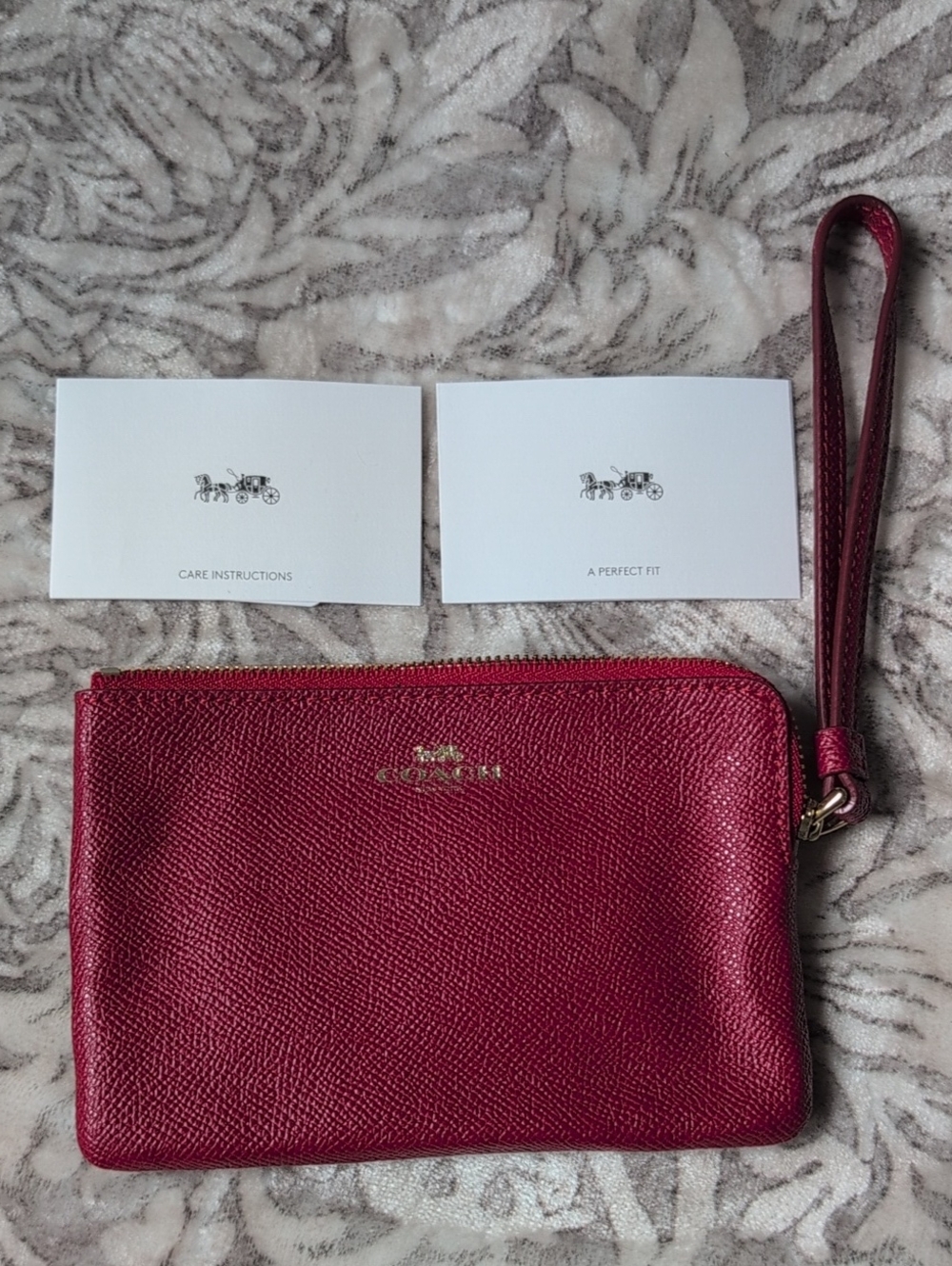 Coach Metallic Burgundy Leather Wristlet with Gold Logo